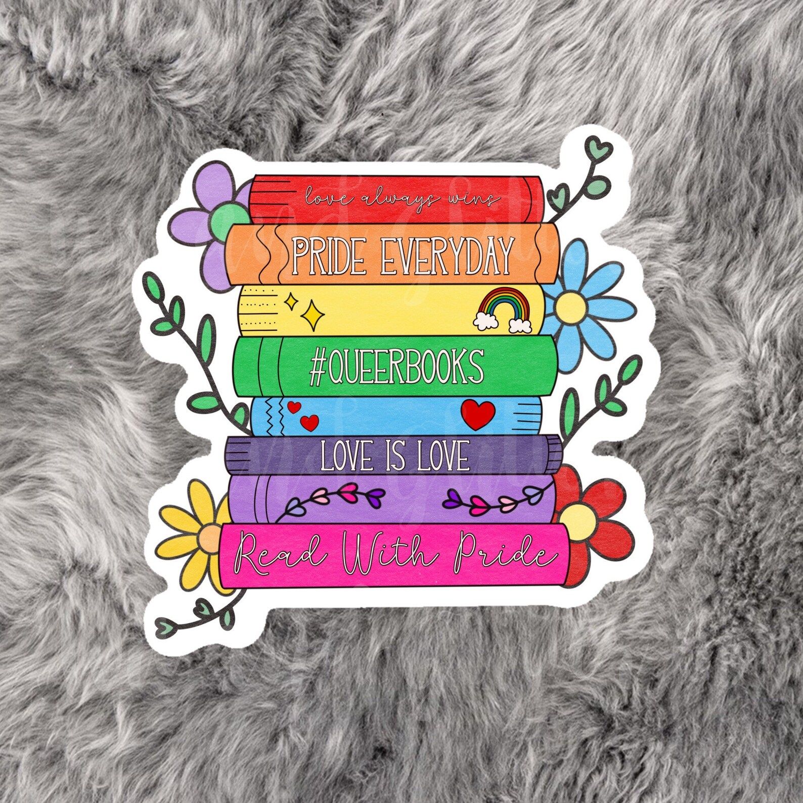 a rainbow book stack sticker