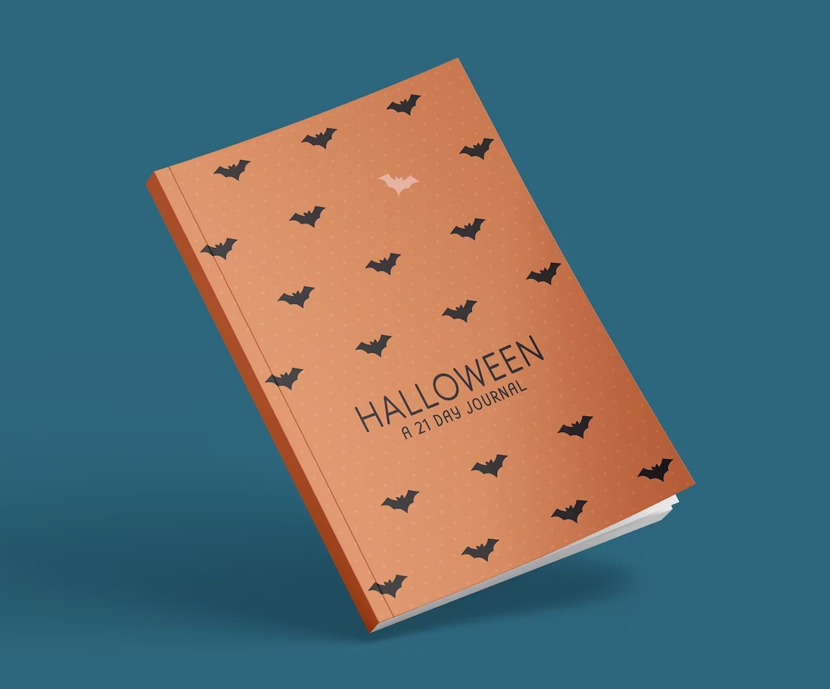 Copper journal with black bats and the words "Halloween: A 21 Day Journal"