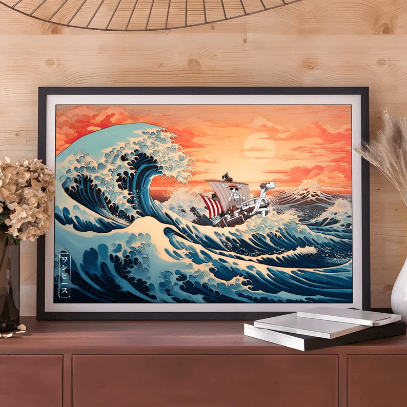 Photo of a print in a frame with a depiction of the Great Wave Of Kanagawa with the One Piece shipping riding the wave.