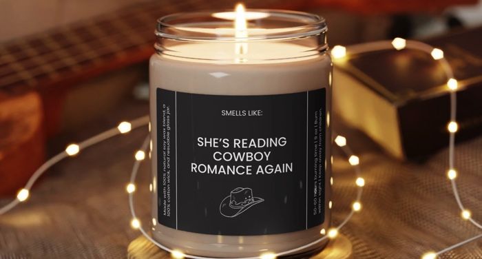 she's reading cowboy romance again candle