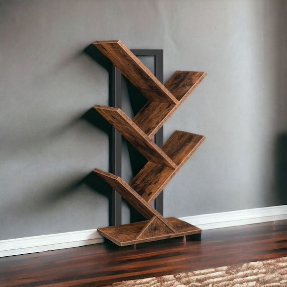 a bookshelf with angled shelves like a tree