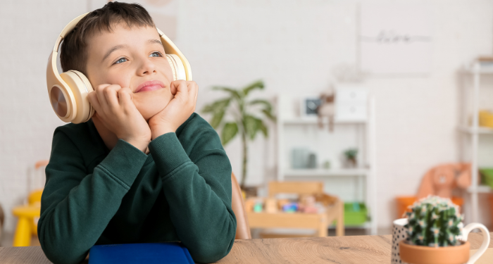 a child listening to headphones