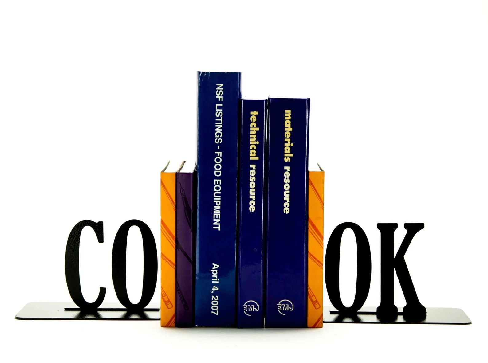 a photo of bookends that spell the word "cook"