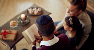 a photo of a Jewish family reading together