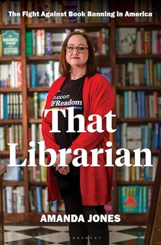 cover of That Librarian: The Fight Against Book Banning in America by Amanda Jones; photo of a white women with brown hair wearing glasses and a red sweater sanding in front of bookshelves