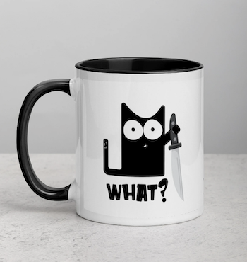 Cat holding a knife "what?" mug