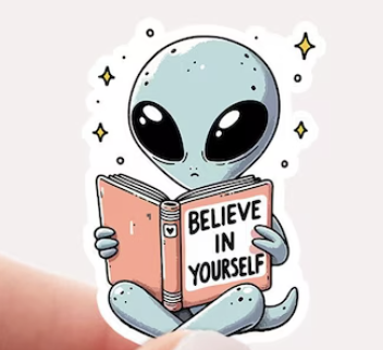 sticker of an alien reading a book titled Believe in Yourself