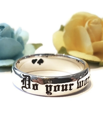 Ring with "do your worst, for I will do mine" inscribed on it