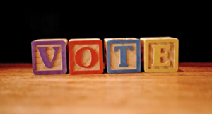 vote spelled out in blocks