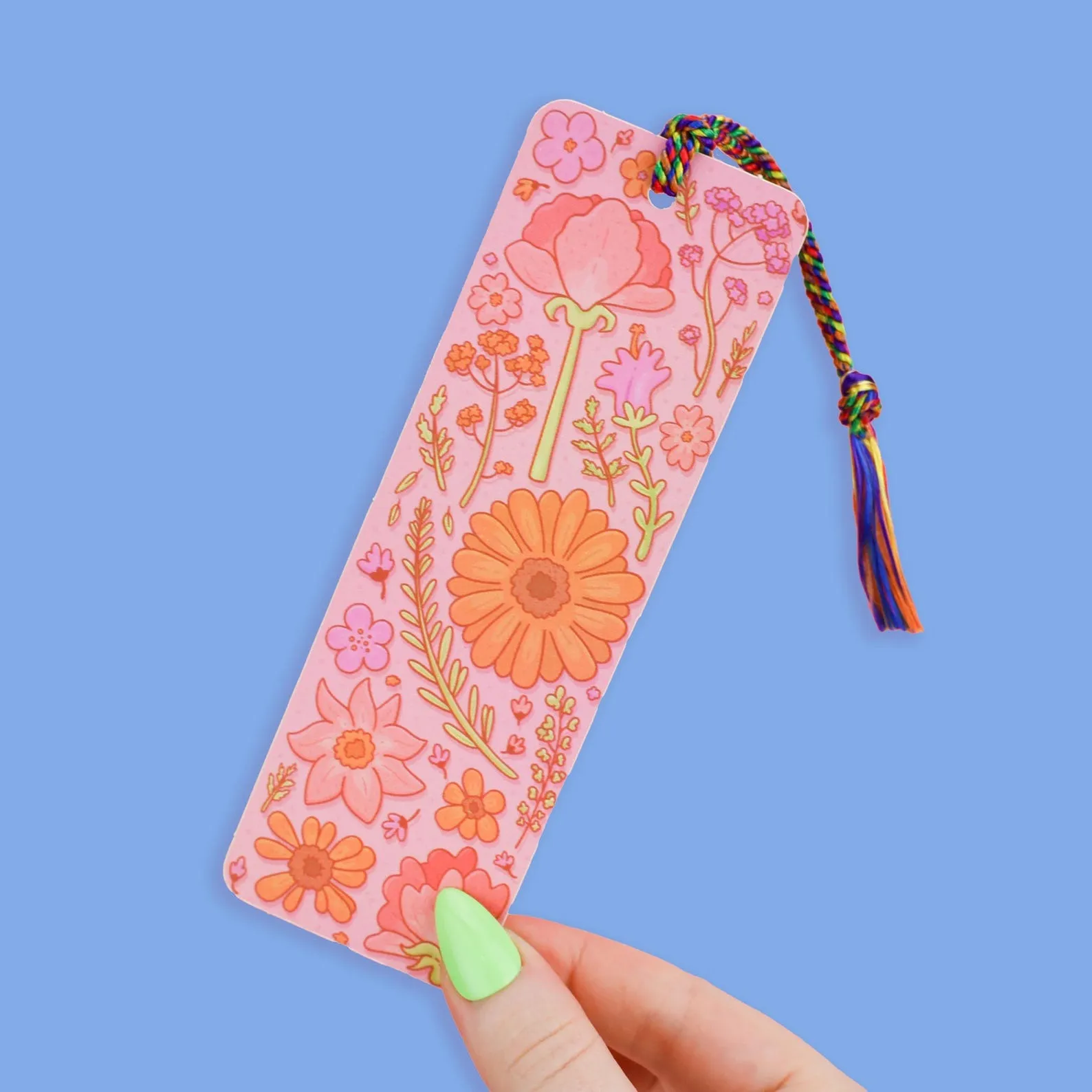 a bookmark with illustrations of flowers